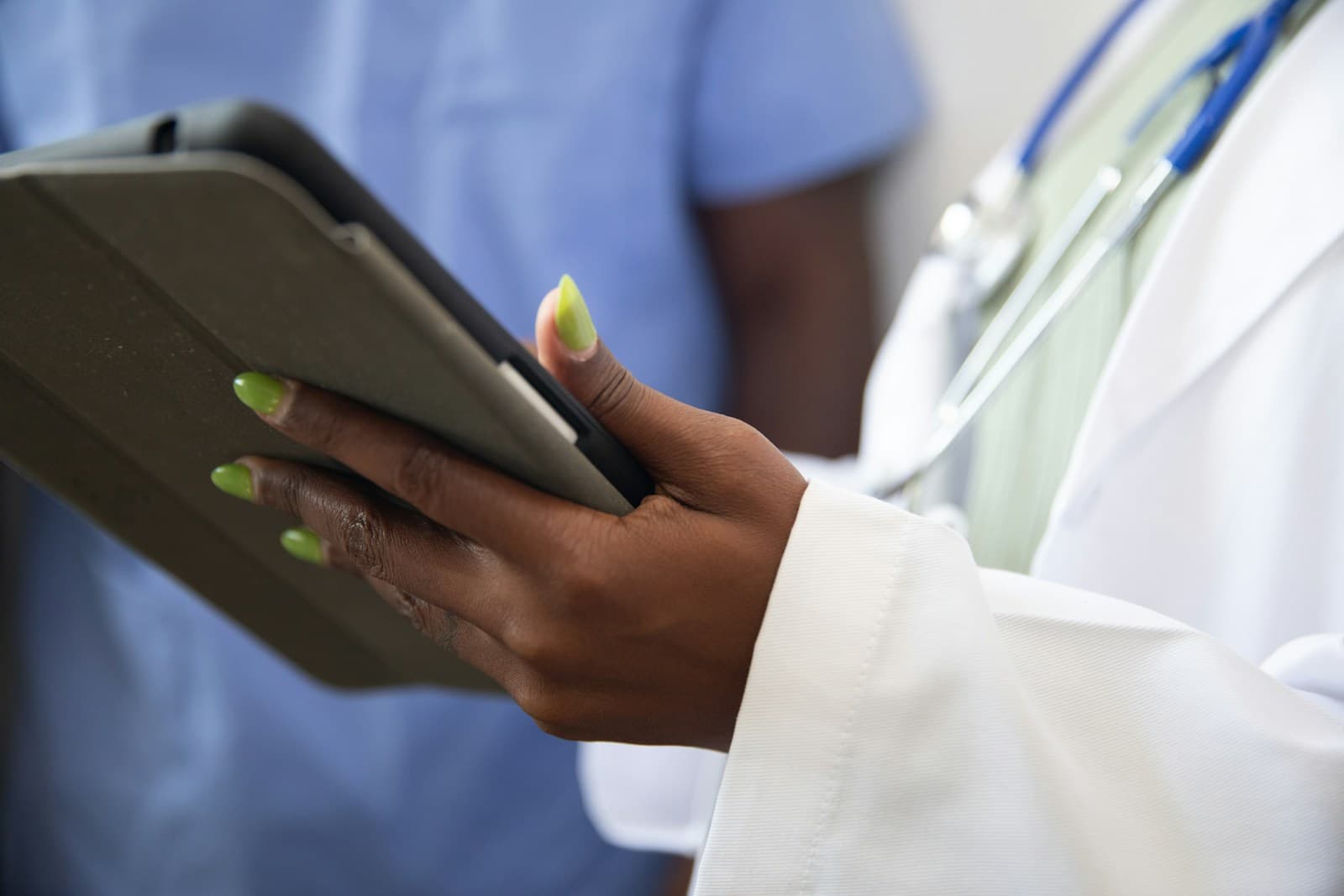 Clinician reviewing AI-assisted patient documentation
