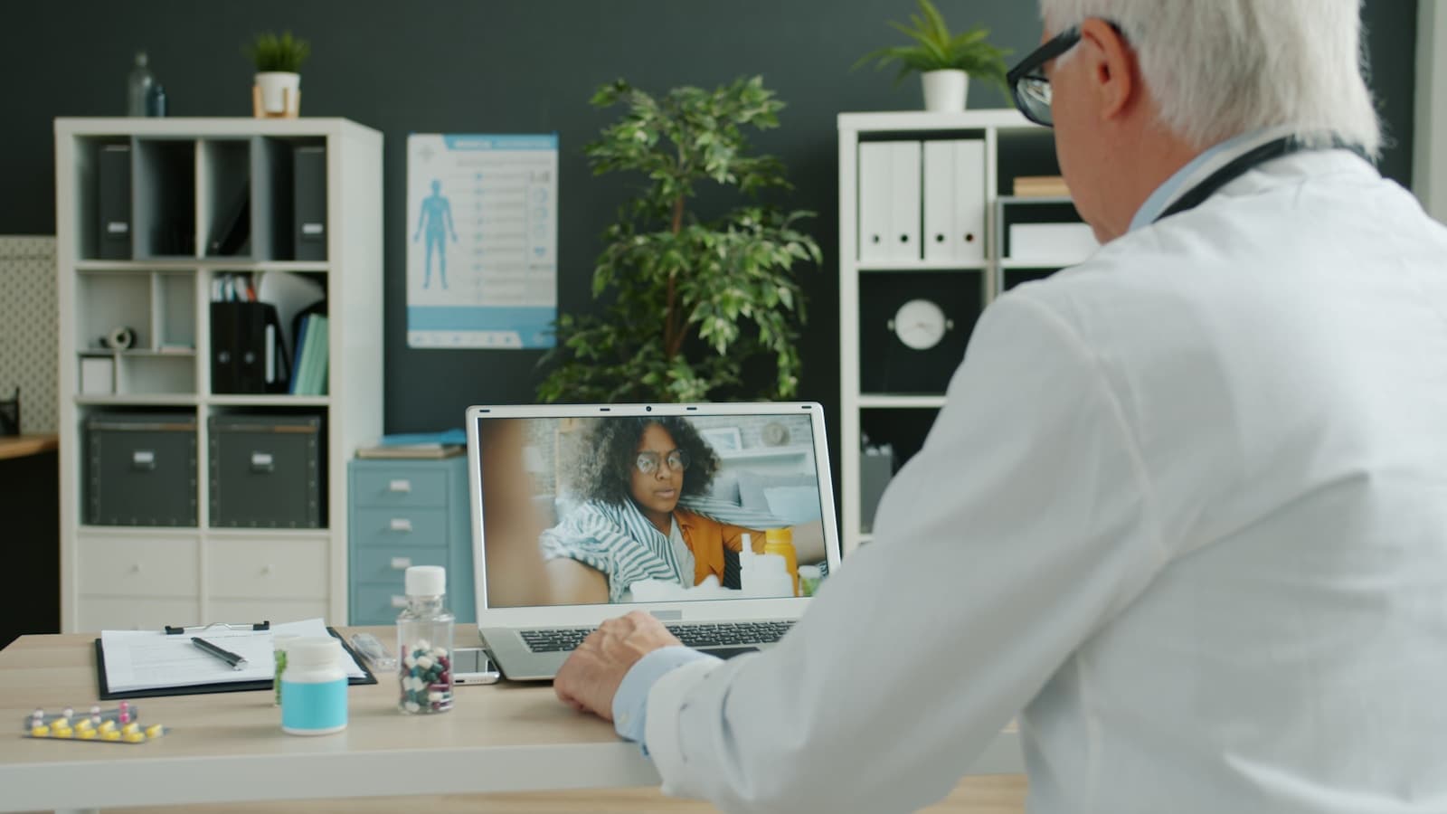 Behavioral health care manager conducting a telehealth session with a primary care patient