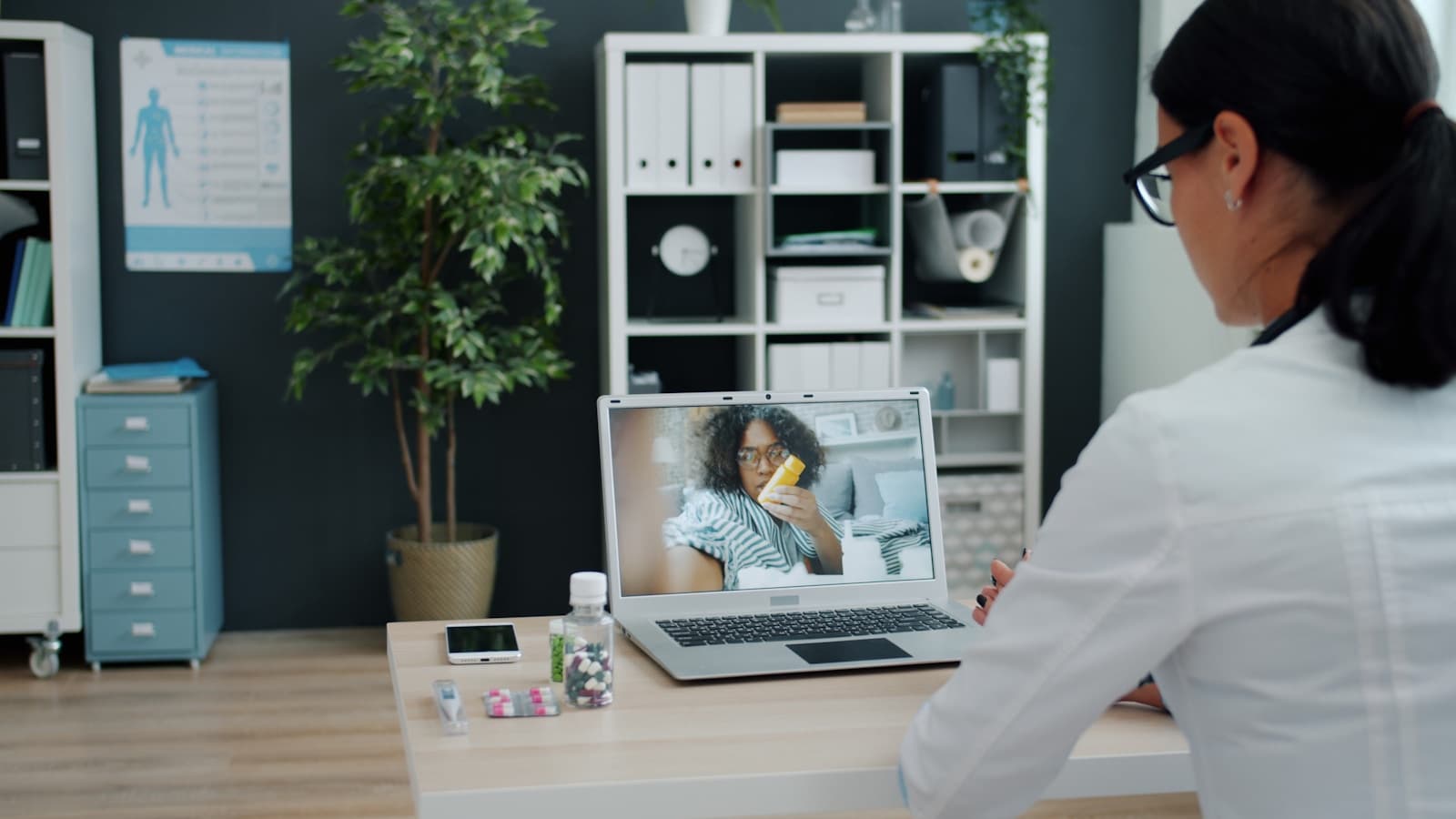 Therapist checking in with a therapy patient over a telehealth video visit