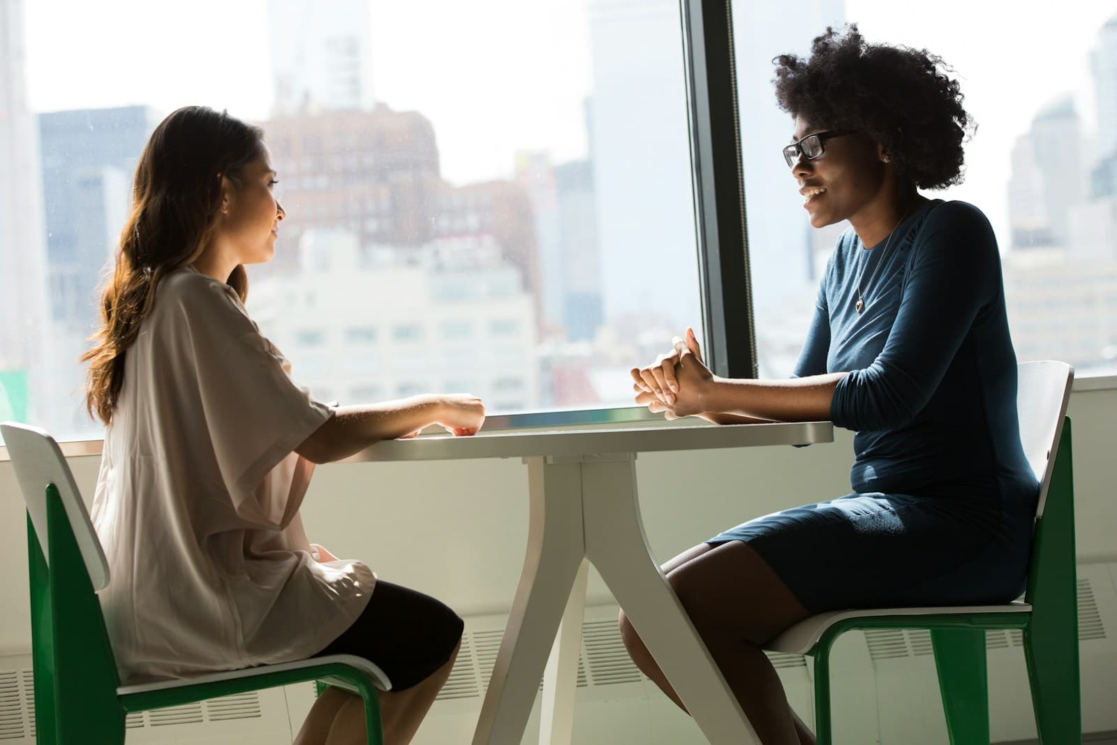 A wellness coach guiding a client, the kind of high-touch experience Hoss Care extends