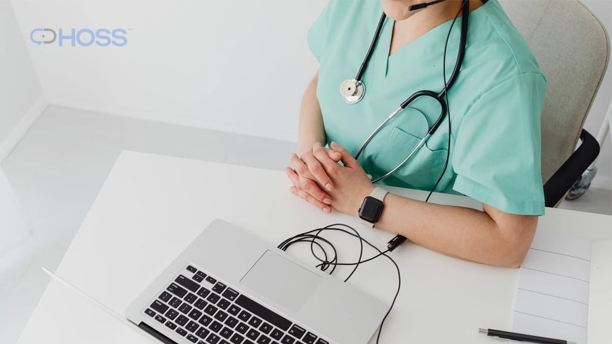 Remote clinical care manager supporting patient care from a laptop.