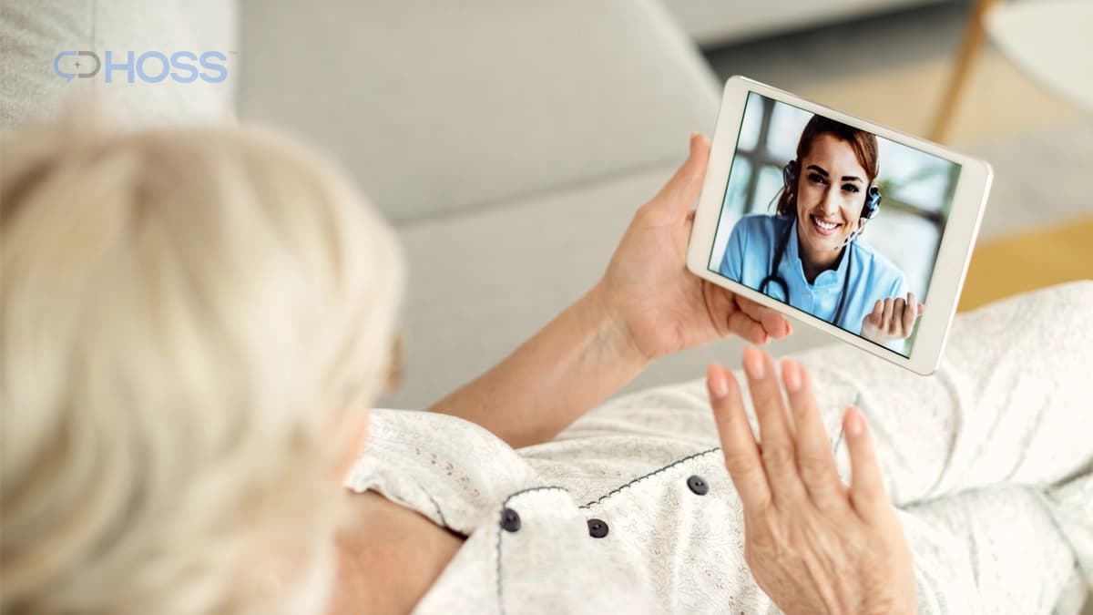 Senior patient speaking with her doctor during a video follow-up call.