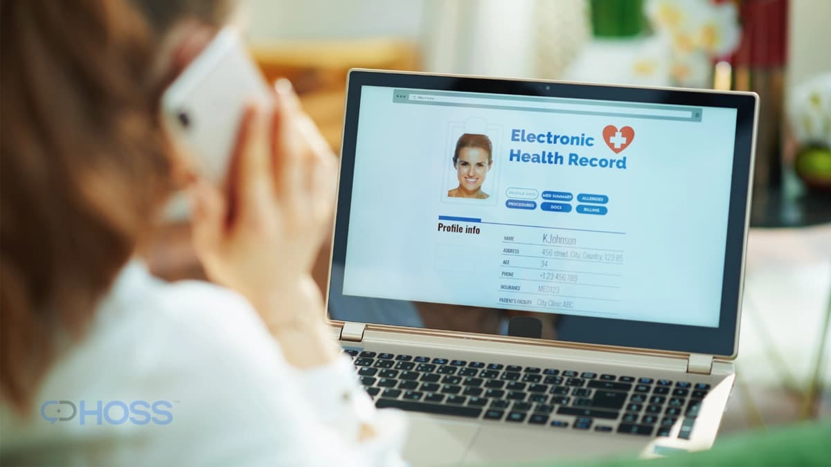 Clinician reviewing an electronic health record during patient follow-up